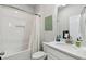 Clean bathroom with white cabinets and bathtub at 17860 Passionflower Cir, Clermont, FL 34714