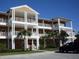 Condo building exterior, featuring multiple stories and balconies at 204 Rum Run # 36204, Davenport, FL 33837