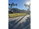 Community entrance with landscaping and a white bicycle at 2208 Antigua Pl # 924, Kissimmee, FL 34741