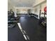 Well-equipped fitness center with cardio and weight machines at 2208 Antigua Pl # 924, Kissimmee, FL 34741