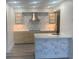 Modern kitchen with white quartz countertops and stylish backsplash at 2208 Antigua Pl # 924, Kissimmee, FL 34741