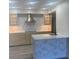 Modern kitchen with white quartz countertops and stylish backsplash at 2208 Antigua Pl # 924, Kissimmee, FL 34741