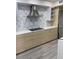 Modern kitchen with white quartz countertops and stylish backsplash at 2208 Antigua Pl # 924, Kissimmee, FL 34741