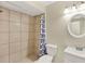 Clean bathroom with a shower/tub combo and updated vanity at 2690 Granada Run, Winter Park, FL 32792