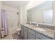 Bathroom with double vanity, tub, and shower at 3282 Eastgrove Ter, Sanford, FL 32771