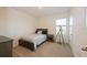 Bedroom with a full bed and window at 3282 Eastgrove Ter, Sanford, FL 32771