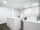 Modern bathroom with white marble vanity and walk-in shower at 3692 Okeechobee Cir, Casselberry, FL 32707