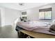 Bright bedroom with a comfortable bed and workspace at 3692 Okeechobee Cir, Casselberry, FL 32707