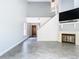Living room with fireplace, tile floors, and staircase at 3692 Okeechobee Cir, Casselberry, FL 32707
