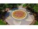 Circular splash pad with benches for seating at 7128 Five Oaks Dr, Harmony, FL 34773