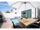 Private backyard oasis with a plunge pool and patio furniture at 212 Villa Domani Cir, Davenport, FL 33896