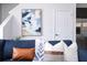Living room with blue sofa, brown throw pillows, and a modern coffee table at 212 Villa Domani Cir, Davenport, FL 33896