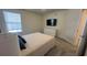 Comfortable bedroom with a queen bed and ample closet space at 2774 Bright Bird Ln, Winter Park, FL 32792