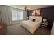 Spacious main bedroom with a king-size bed and elegant decor at 2774 Bright Bird Ln, Winter Park, FL 32792