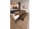 Farmhouse dining table with bench seating in the dining area at 2774 Bright Bird Ln, Winter Park, FL 32792