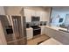 Stainless steel appliances and white shaker cabinets at 2774 Bright Bird Ln, Winter Park, FL 32792