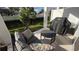 Relaxing patio with seating area and built-in grill at 2774 Bright Bird Ln, Winter Park, FL 32792