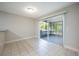 Dining area with tile floors and access to a patio at 614 Heatherton Vlg, Altamonte Springs, FL 32714