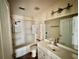 Clean bathroom with a shower/tub combo, vanity, and mirror at 762 Rosalie Way, Winter Springs, FL 32708