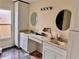 Double sink bathroom vanity with white cabinets at 762 Rosalie Way, Winter Springs, FL 32708