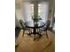 Small dining area with a round table and jute rug at 762 Rosalie Way, Winter Springs, FL 32708