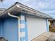 White garage door and light blue exterior wall at 762 Rosalie Way, Winter Springs, FL 32708