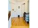 Hallway with hardwood floors and access to other rooms at 762 Rosalie Way, Winter Springs, FL 32708