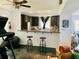 Kitchen features a breakfast bar, dark cabinetry, and stainless steel appliances at 762 Rosalie Way, Winter Springs, FL 32708