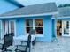 Outdoor patio with table and chairs, adjacent to kitchen at 762 Rosalie Way, Winter Springs, FL 32708