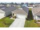 Aerial view of a house in a residential neighborhood at 905 August Sky Dr, Deltona, FL 32738