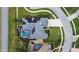 Aerial view showing home, pool, and solar panels in a residential area at 9095 Laurel Ridge Dr, Mount Dora, FL 32757