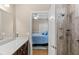 Bright bathroom with walk-in shower and double vanity at 9095 Laurel Ridge Dr, Mount Dora, FL 32757