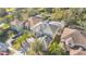 Aerial view of a two story house with a pool and a backyard at 9168 Lake Avon Dr, Orlando, FL 32829