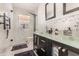 Modern bathroom with double sinks and glass shower at 9168 Lake Avon Dr, Orlando, FL 32829