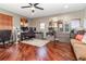 Spacious home office with hardwood floors and built-in shelving at 9168 Lake Avon Dr, Orlando, FL 32829