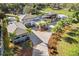 Aerial view of home, landscaping and surrounding area at 10230 Park Ridge Gotha Rd, Windermere, FL 34786