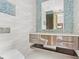 Stylish bathroom with floating vanity and mosaic tile at 10230 Park Ridge Gotha Rd, Windermere, FL 34786