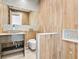 Modern bathroom with wood-look tile and a sleek vanity at 10230 Park Ridge Gotha Rd, Windermere, FL 34786