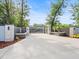 Private gated entry with stone pillars and modern gate at 10230 Park Ridge Gotha Rd, Windermere, FL 34786