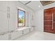Bright entry with built-in storage and modern finishes at 10230 Park Ridge Gotha Rd, Windermere, FL 34786