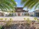 Modern home with sleek design and lush landscaping at 10230 Park Ridge Gotha Rd, Windermere, FL 34786