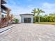 Attached garage with glass door and paver driveway at 10230 Park Ridge Gotha Rd, Windermere, FL 34786