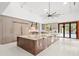 Gourmet kitchen boasts modern cabinetry and a large island at 10230 Park Ridge Gotha Rd, Windermere, FL 34786