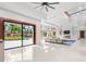 Bright living room with sliding doors opening to patio at 10230 Park Ridge Gotha Rd, Windermere, FL 34786