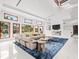 Open living space featuring a sectional sofa and large windows at 10230 Park Ridge Gotha Rd, Windermere, FL 34786