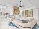 Elegant living room with a unique fireplace feature at 10230 Park Ridge Gotha Rd, Windermere, FL 34786