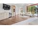 Main bedroom features a sitting area and access to the backyard pool at 10230 Park Ridge Gotha Rd, Windermere, FL 34786