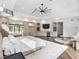 Luxurious main bedroom with large bed, sitting area and private access to the pool at 10230 Park Ridge Gotha Rd, Windermere, FL 34786