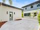 Private patio with light-colored tile and modern lighting at 10230 Park Ridge Gotha Rd, Windermere, FL 34786
