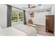 Bright bedroom featuring a comfortable bed and built-in shelving at 2330 Westminster Ct, Winter Park, FL 32789